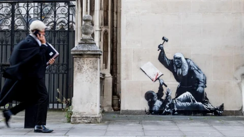 Banksy mural of a judge beating a protester to be removed