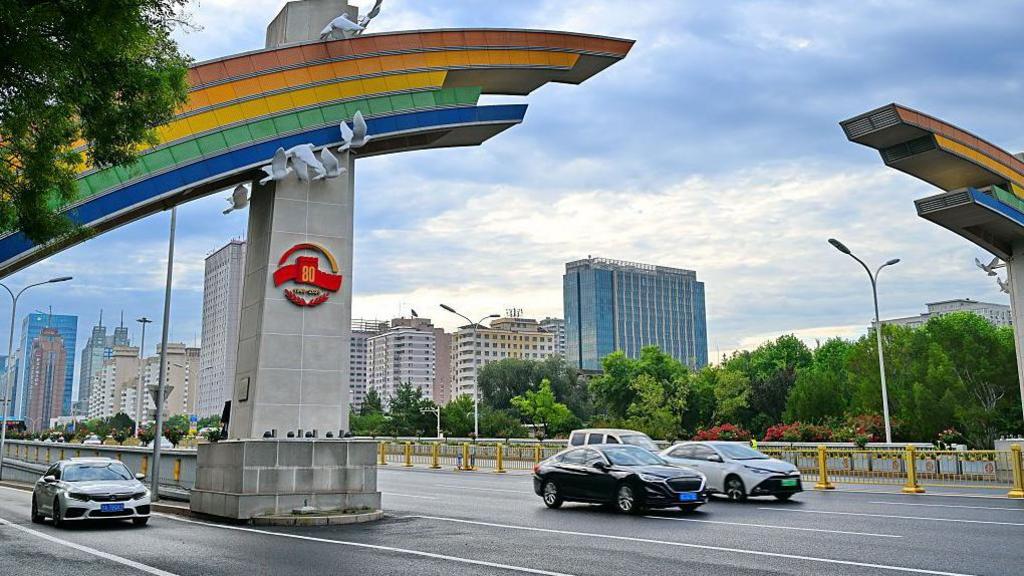 A themed installation is set up on a rainbow-shaped gate on Chang'an Avenue