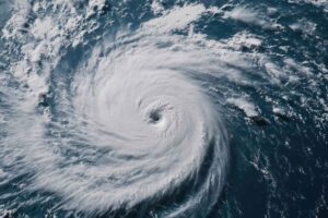 How do hurricanes or typhoons form and are they getting stronger?