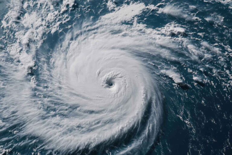 How do hurricanes or typhoons form and are they getting stronger?